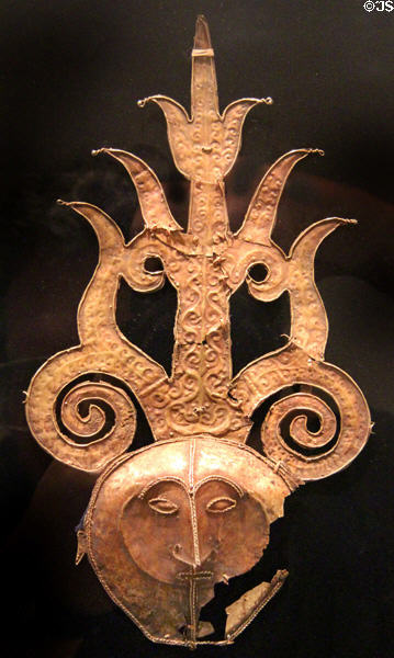 Gold headdress ornament with a human face (19th C) from Southeast Moluccas Islands, Indonesia at Dallas Museum of Art. Dallas, TX.