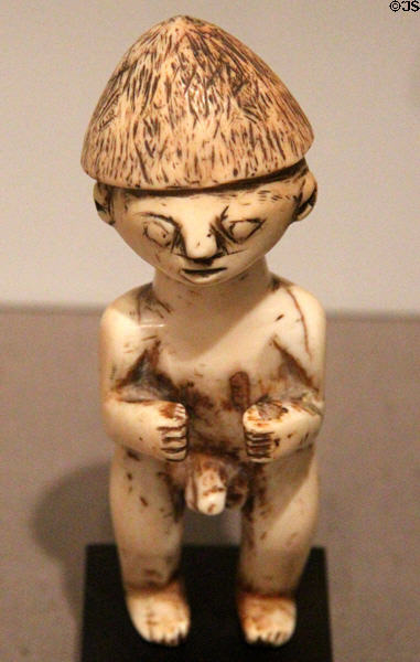 Ivory standing male figure (late 19th-early 20thC) from Southeast Moluccas Islands, Indonesia at Dallas Museum of Art. Dallas, TX.
