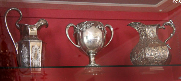 Silver pitchers & cup at Neill-Cochran House Museum. Austin, TX.
