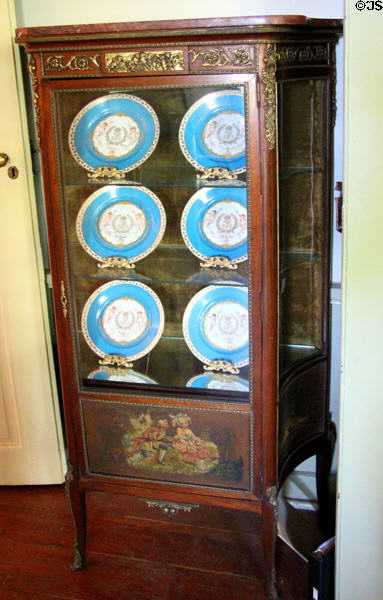 Vitrine with blue porcelain plates at French Legation Museum. Austin, TX.