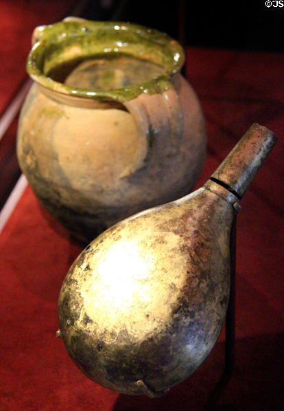 Brass powder flask (c1684) & firepot (c1684) used to ignite enemy ships at Bullock Texas State History Museum. Austin, TX.