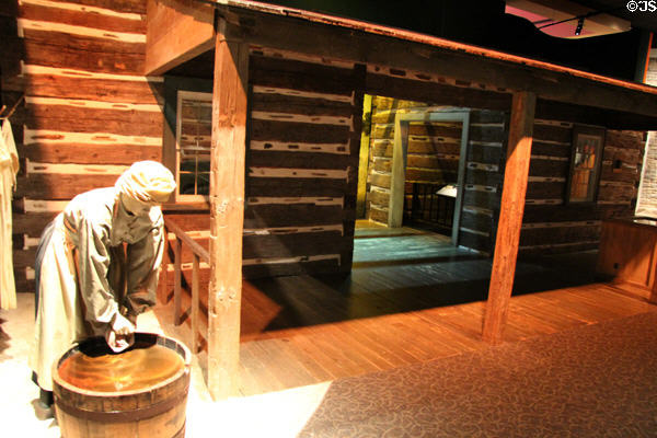 Replica of log dogtrot cabin at Bullock Texas State History Museum. Austin, TX.