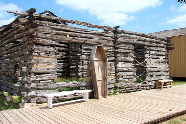 Cedar log barn (1858) at Pioneer Farms. Austin, TX.