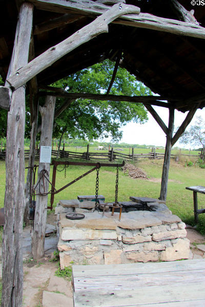 Outdoor kitchen at Kruger log cabin at Pioneer Farms. Austin, TX.