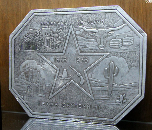 Remember the Alamo Texas Centennial (1936) metal plaque at Gonzales Historical Memorial. Gonzales, TX.