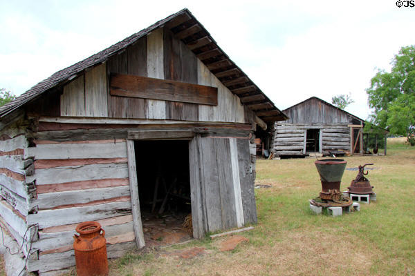 Log granary & barn (c1860s-70s) at Pioneer Village. Gonzales, TX.