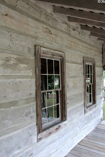 Windows in log walls at Eggleston House moved to near Gonzales Memorial for 1936 Texas Centennial. Gonzales, TX.