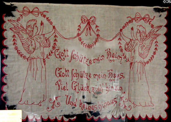 Embroidered cloth with German saying in Locksted-Seibold house at Conservation Plaza. New Braunfels, TX.