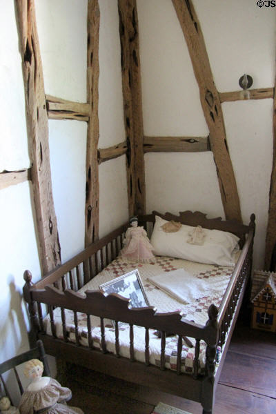 Child's bed with side rails in loft of Baetge House at Conservation Plaza. New Braunfels, TX.