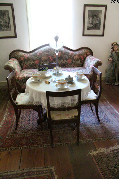 Tea table in parlor of Baetge House at Conservation Plaza. New Braunfels, TX.