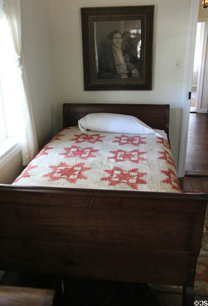 Sleigh bed, attrib. Heinrich Scholl, & quilt at Museum of Texas Handmade Furniture. New Braunfels, TX.