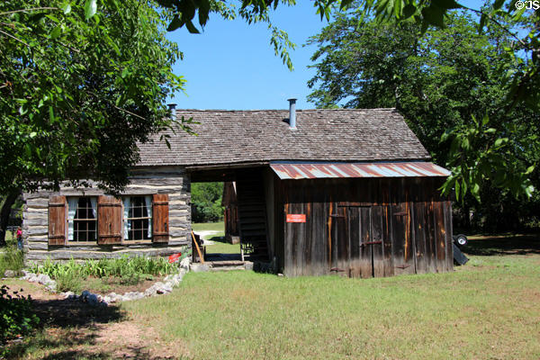 The Reininger Log Cabin with "dog trot" style at Museum of Texas Handmade Furniture. New Braunfels, TX.