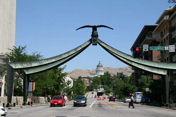 Utah State Capitol seen through Eagle Gate up State Street. Salt Lake City, UT.