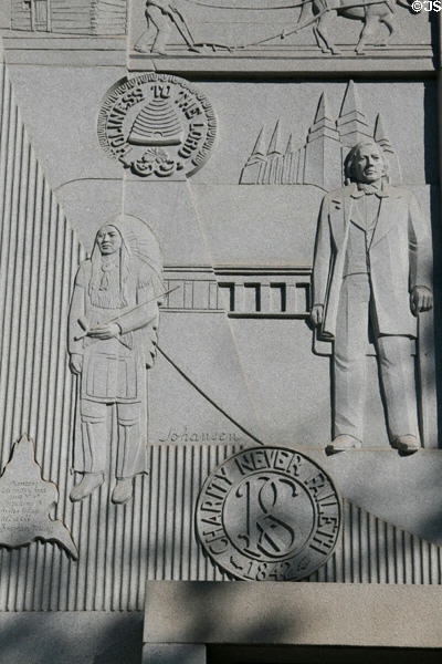 Detail on carved church history mural outside Mormon Museum. Salt Lake City, UT.