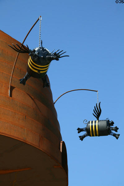 Flying Objects theme art detail of flying piglets with bee strips around beehive by Fred Conlon near Convention Center. Salt Lake City, UT.
