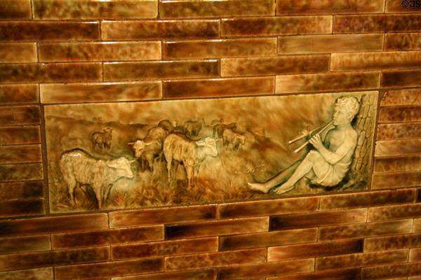 American encaustic tile shepherd sculpture on dining room fireplace of Hunter House museum. Norfolk, VA.