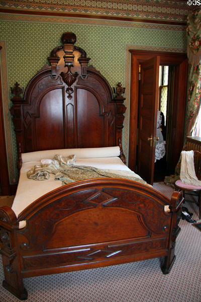 Bedroom with carved bed in Hunter House museum. Norfolk, VA.