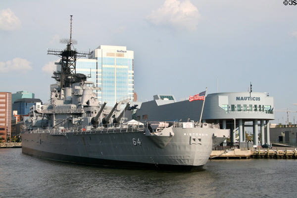 Battleship Wisconsin & Nauticus complex against skyline of Norfolk. Norfolk, VA.