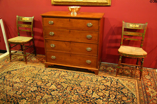 Chest of drawers (c1800) which belonged to James Madison's mother plus painted chairs (c1800-20) at James Madison Museum. Orange, VA.