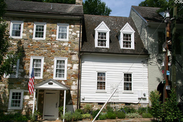 Three-story Federal-style fieldstone house (40170 Main St.) with wooden infill. Waterford, VA.
