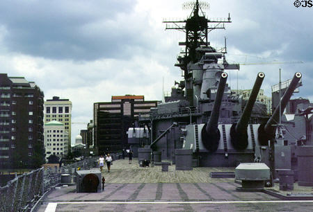 Battleship Wisconsin & skyline of Norfolk at Hampton Road Naval Museum. Norfolk, VA.