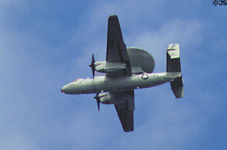US Navy E2-C Hawkeye radar plane over Chesapeake Bay Bridge. VA.