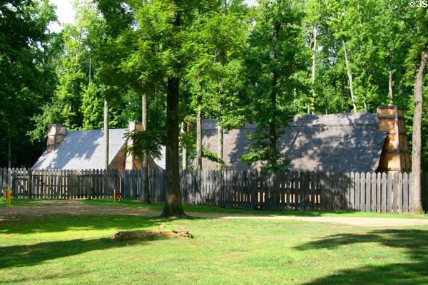 Stockade & replica colonists structures of Henricus. VA.