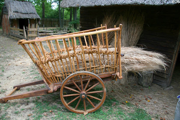 Handcart with straw at Henricus. VA.