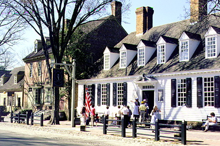 Raleigh Tavern (1717) with brick Unicorn's Horn & John Carter's store in distance in Colonial Williamsburg. Williamsburg, VA.