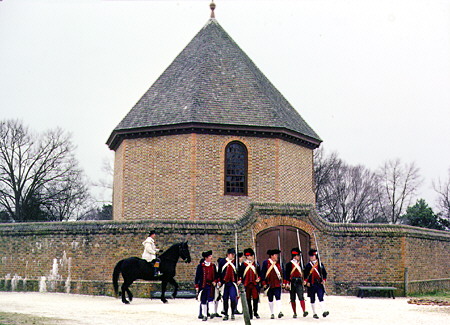Soldiers parade in front of the octagonal magazine & arsenal. Williamsburg, VA.