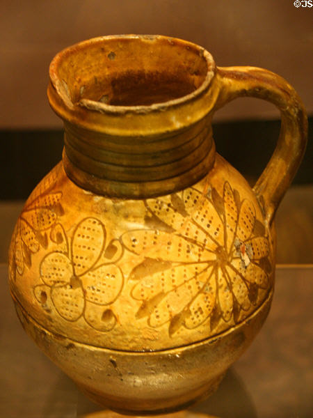 Earthenware sgraffito slipware jug (c1650-1700) from North Devon, England in Jamestown National Park Museum. Jamestown, VA.