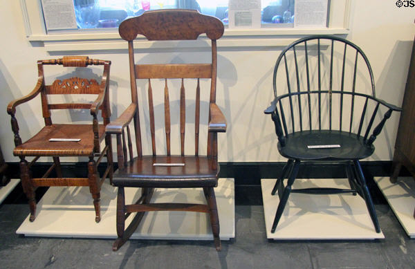 Arm chair (1815-35) by unknown, rocking chair (1838) by Henry F. Dewey & Windsor chair (c1800) prob. by Amasa Elwell all from Bennington, VT at Bennington Museum. Bennington, VT.