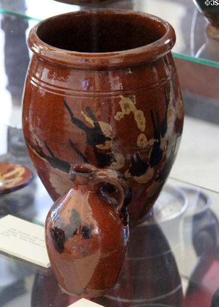 Redware crock & jug (19thC) from PA at Bennington Museum. Bennington, VT.