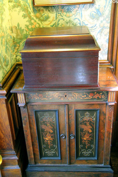 Inlaid cabinet supporting music box at Park-McCullough Historic Estate. North Bennington, VT.