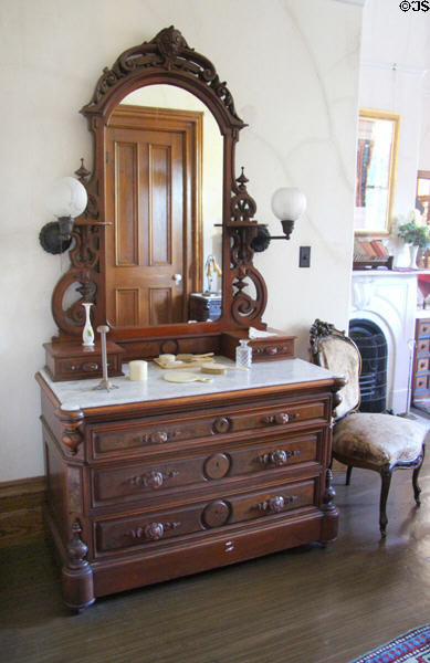 Vanity dresser with mirror (1865-80) in bedroom at Park-McCullough Historic Estate. North Bennington, VT.