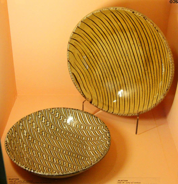 Combed slipware plates (late 18thC - early 19thC) at Shelburne Museum. Shelburne, VT.