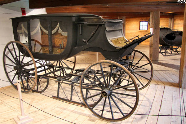 Horse-drawn hearse with interchangeable wheels & sleighs (c1849) by A. Tolman & Co. of Worcester, MA in Round Barn at Shelburne Museum. Shelburne, VT.