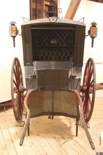 Front view of Hansom Cab (c1895) by Hinks & Johnson of Bridgeport, CT in Round Barn at Shelburne Museum. Shelburne, VT.
