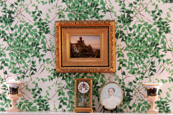 Painting, clock & green wallpaper over mantle of southeast bedroom at Marsh-Billings-Rockefeller Mansion. Woodstock, VT.