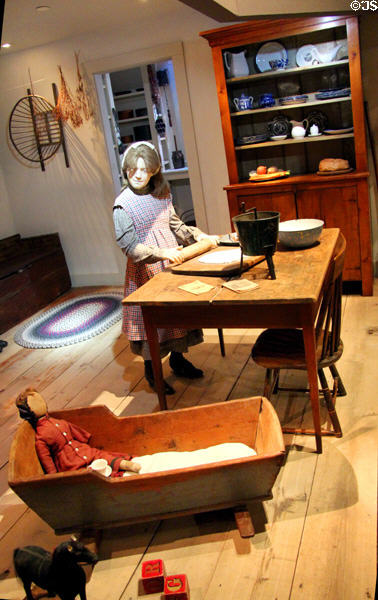 Recreated farm kitchen with cradle at Billings Farm & Museum. Woodstock, VT.