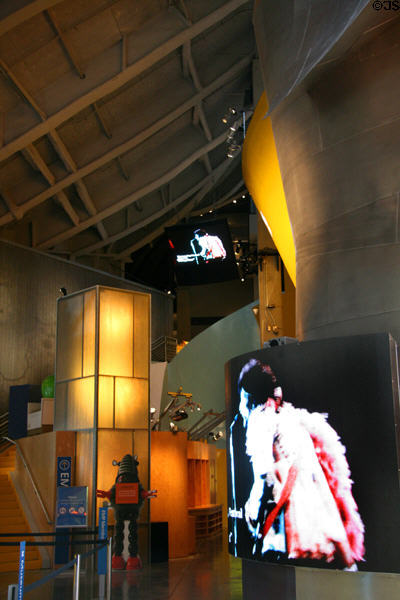 Video screens introduce rock & roll in entrance lobby of EMP|FSM. Seattle, WA.