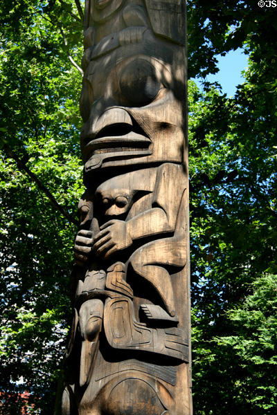 Detail of totem pole (1980s) by Duane Pasco in Occidental Park. Seattle, WA.