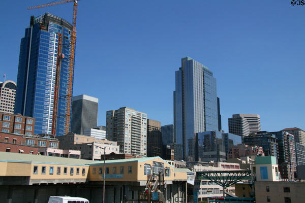 Skyline of Seattle with Pike Place Market buildings strung along escarpment edge. Seattle, WA.