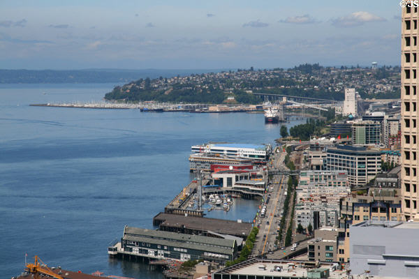 Overview of Seattle's waterfront Elliott Bay to Olympic Mountain Range. Seattle, WA.