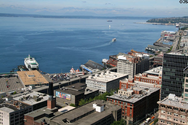 Olympic Mountain Range & Seattle waterfront from Columbia Center Sky View. Seattle, WA.