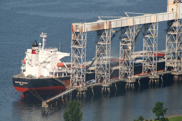 Ship loading at Seattle grain elevator. Seattle, WA.