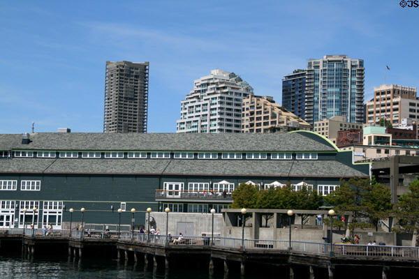 Seattle Aquarium & apartments on city skyline. Seattle, WA.