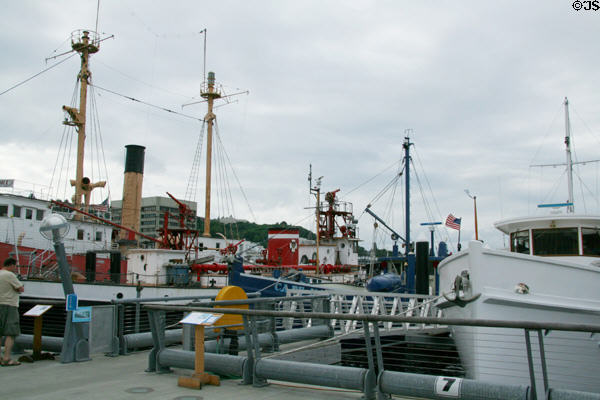 Row of historic ships at Northwest Seaport of Lake Union Park. Seattle, WA.