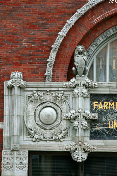 Sullivan decoration with lion & date on Farmer's & Merchant's Union Bank. Columbus, WI.