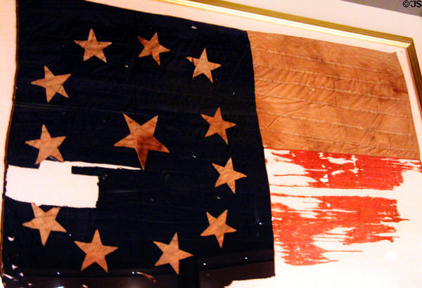 Flag of The Confederate Logan Wildcats (later part of 36th Virginia Infantry) made by Lizzie & Susan Pillinger, Jane & Valire Morgan, Mary Casebolt & Harriet Avis at West Virginia State Museum. Charleston, WV.